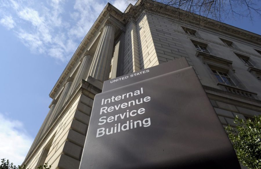FILE - The exterior of the Internal Revenue Service (IRS) building in Washington on March 22, 2013. The IRS is showcasing its new capability to aggressively audit high-income tax dodgers as it makes the case for sustained funding and tries to avert budget cuts sought by Republicans who want to gut the agency. IRS leaders said they collected $38 million in delinquent taxes from more than 175 high-income taxpayers in the past few months.(AP Photo/Susan Walsh, File)