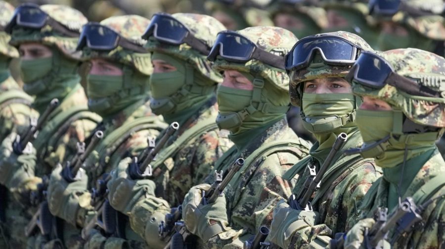 FILE - Serbian Army soldiers perform during a military exercise, at Batajnica Air Base near Belgrade, Serbia, on April 22, 2023. Serbia on Friday, June 23, 2023 reiterated the threat of an armed intervention in its former province of Kosovo, unless the NATO-led peacekeepers stationed there don't protect the minority Serbs there from "the great terror" of the Kosovo "regime." Serbian army chief-of-staff, Gen. Milan Mojsilovic, said that the military stands ready to fulfil its tasks "in accordance to the constitution" and orders from the army supreme commander, President Aleksandar Vucic. (AP Photo/Darko Vojinovic, File)