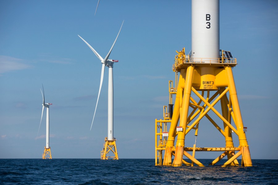 FILE - Three wind turbines stand in the water off Block Island, R.I, the nation's first offshore wind farm, Aug. 15, 2016. The first auction of offshore leases for wind power development in the Gulf of Mexico off the Louisiana and Texas coasts will be held Tuesday, Aug. 29, 2023, the Biden administration announced Thursday, July 20. (AP Photo/Michael Dwyer, File)