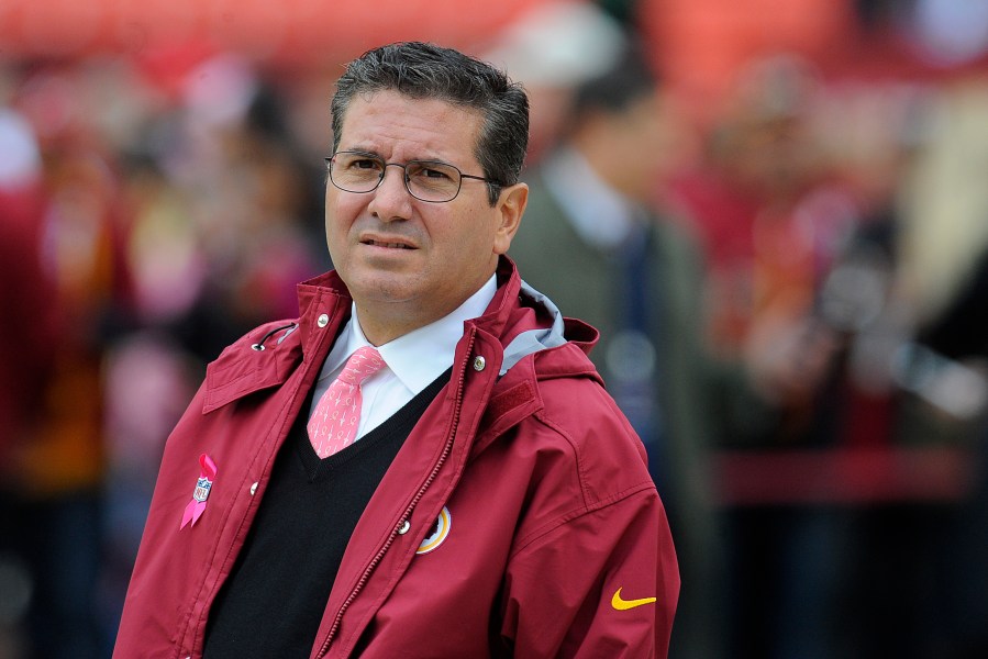 FILE - Washington Redskins owner Daniel Snyder watches his team warm up before an NFL football game against the Atlanta Falcons in Landover, Md., Sunday, Oct. 7, 2012. Snyder sexually harassed a team employee and oversaw team executives who deliberately withheld millions of dollars in revenue from other clubs, and he has agreed to pay a $60 million fine, the league announced Thursday, July 20, 2023. (AP Photo/Richard Lipski, File)