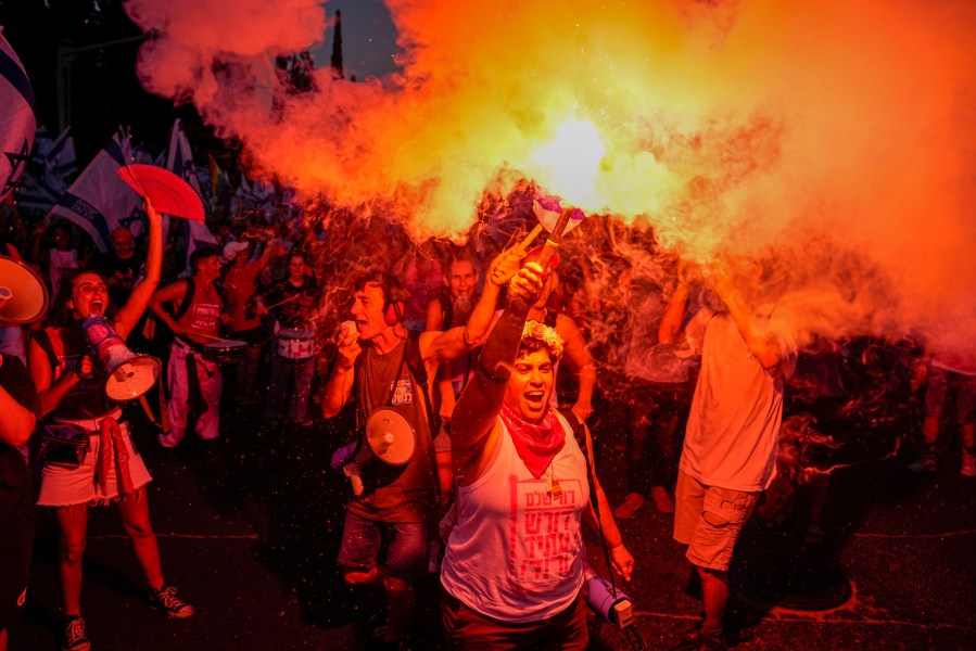 Israelis protest against plans by Prime Minister Benjamin Netanyahu's government to overhaul the judicial system in Tel Aviv, Israel, Saturday, July 15, 2023. (AP Photo/Ariel Schalit)