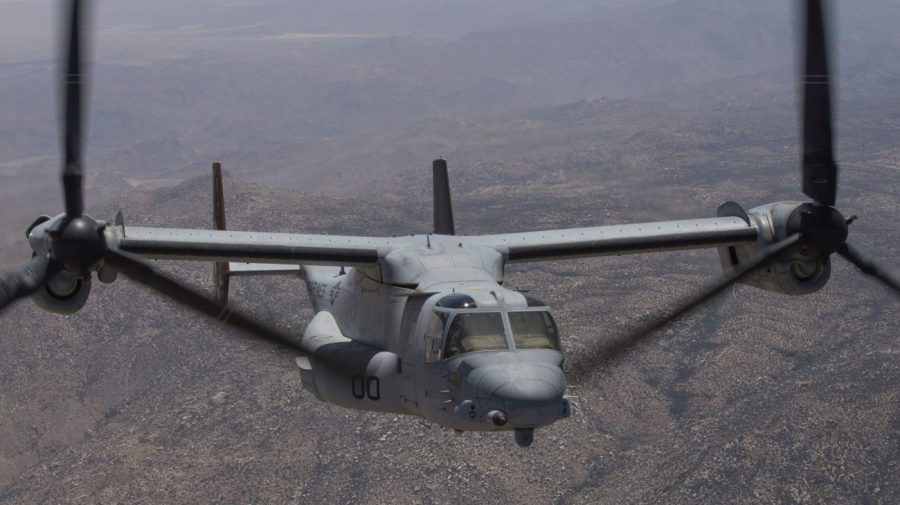 FILE - In this photo provided by U.S. Marine Corps/3rd MAW, an MV-22B Osprey with Marine Operational Test and Evaluation Squadron (VMX) 1 transports ordnance during an Expeditionary Advanced Base Operation (EABO) exercise to Old Highway 101 near Marine Corps Base Camp Pendleton, Calif., on May 25, 2022. The deadly crash of a Marine V-22 Osprey, like the one shown, in California last year was caused by mechanical failure, according to an investigation that ruled out pilot and maintenance errors. (U.S. Marine Corps via AP, File)