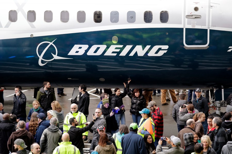 FILE- In this Feb. 5, 2018, file photo a Boeing 737 MAX 7 is displayed during a debut for employees and media of the new jet in Renton, Wash. The Boeing Company reports earnings on Wednesday, July 26, 2023. (AP Photo/Elaine Thompson, File)