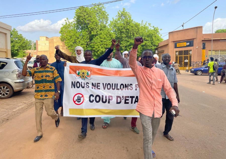 Supporters of Nigerien President Mohamed Bazoum demonstrate in his support in Niamey, Niger, Wednesday July 26, 2023. Governing bodies in Africa condemned what they characterized as a coup attempt Wednesday against Niger's president, whose official Twitter account reported that elements of the presidential guard engaged in an "anti-Republican demonstration" and tried to obtain the support of other security forces. (AP Photo/Sam Mednick)