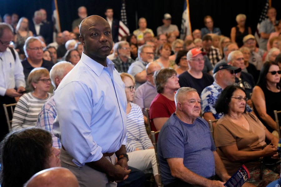 Republican presidential candidate Sen. Tim Scott, R-S.C., waits to speak a town hall meeting, Thursday, July 27, 2023, in Ankeny, Iowa. (AP Photo/Charlie Neibergall)