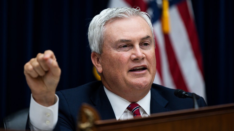 James Comer gestures while speaking during a committee hearing.