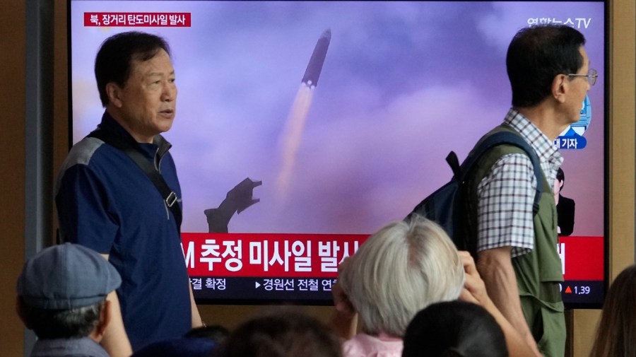 A TV screen shows a file image of North Korea's missile launch during a news program at the Seoul Railway Station in Seoul, South Korea, Wednesday, July 12, 2023. North Korea launched a long-range ballistic missile toward its eastern waters Wednesday, its neighbors said, two days after the North threatened "shocking" consequences to protest what it called a provocative U.S. reconnaissance activity near its territory.