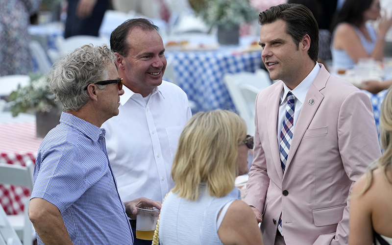 Sens. Rand Paul (R-Ky.), Mike Lee (R-Utah), and Rep. Matt Gaetz (R-Fla.), talk as they attend the Congressional picnic