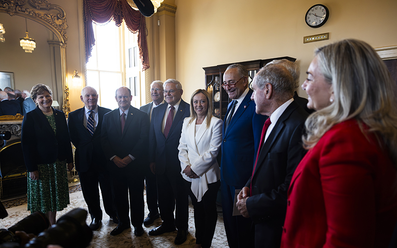 Majority Leader Chuck Schumer (D-N.Y.), Minority Leader Mitch McConnell (R-Ky.), and other senators participate in a photo op