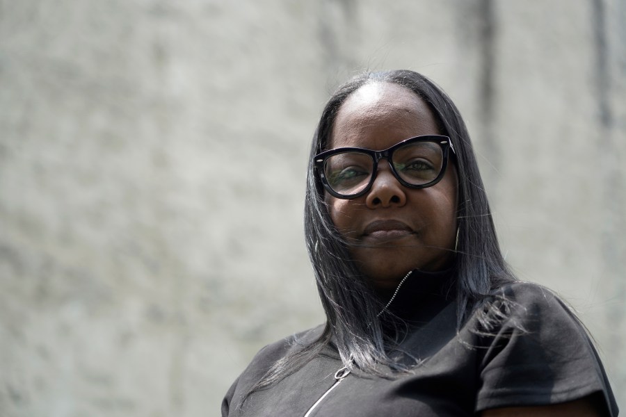 Philadelphia school district teacher Rhonda Hicks poses for a portrait at her home in Philadelphia, Thursday, July 20, 2023. Hicks loved teaching and loved her students, but other aspects of the job deteriorated. When she retires soon, she will join a disproportionately high number of Black and Hispanic teachers in her state who are leaving the profession. (AP Photo/Michael Perez)