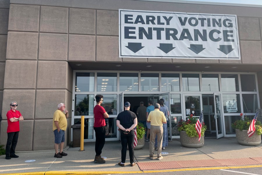 Ohio residents line up to vote early in-person on Issue 1 in front of the Franklin County Board of Elections in Columbus, Ohio on Thursday, Aug. 3, 2023. Ohioans are voting on whether to make it harder to amend the state’s constitution – a decision that could impact another upcoming November vote on abortion rights in the state. (AP Photo/Samantha Hendrickson)