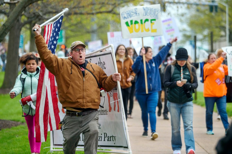 FILE - Opponents of a bill to repeal Connecticut's religious exemption for required school vaccinations march down Capitol Avenue before the State Senate voted on legislation on April 27, 2021, in Hartford, Conn. A federal appeals court on Friday, Aug. 4, 2023, upheld a 2021 Connecticut law that eliminated the state’s longstanding religious exemption from childhood immunization requirements for schools, colleges and day care facilities. (Mark Mirko/Hartford Courant via AP, File)