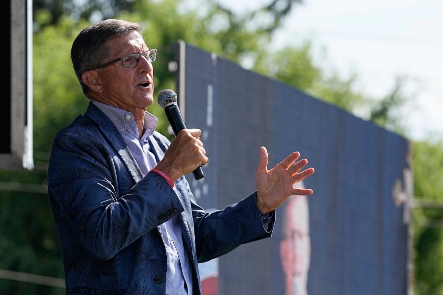 Former national security adviser Michael Flynn speaks during a "rosary rally" on Sunday, Aug. 6, 2023, in Norwood, Ohio. A national religious organization, Catholics for Catholics, gathered a lineup of anti-abortion influencers and conspiracy theorists from across the U.S. to speak at the rally to urge a “yes” vote on a ballot question in Ohio, known as Issue 1, that would make it harder to change the state constitution and could determine the fate of abortion rights. (AP Photo/Darron Cummings)