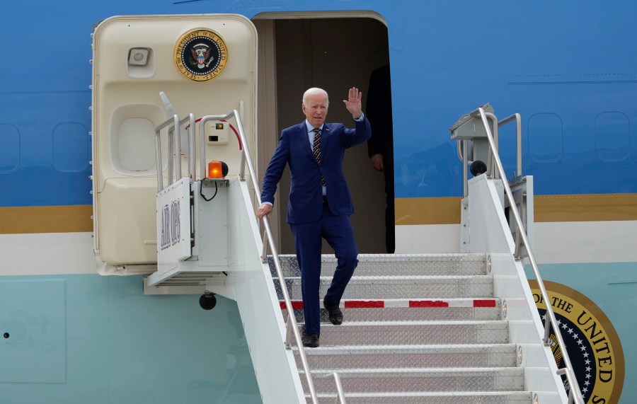 President Joe Biden exits Air Force One after landing at Roland R. Wright Air National Guard Base, Wednesday, Aug. 9, 2023, in Salt Lake City. (Francisco Kjolseth/The Salt Lake Tribune via AP)