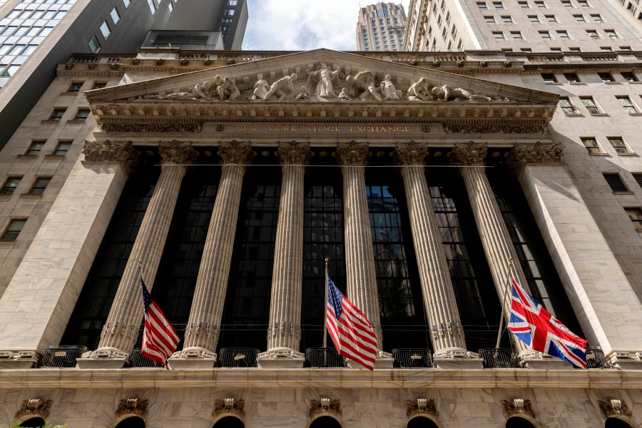 Statues adorn the facade of the New York Stock Exchange, Tuesday, Sept. 13, 2022, in New York. (AP Photo/Julia Nikhinson)