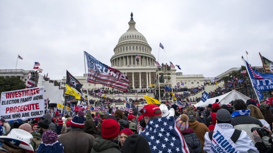 FILE - Insurrectionists loyal to President Donald Trump breach the U.S. Capitol in Washington on Jan. 6, 2021.