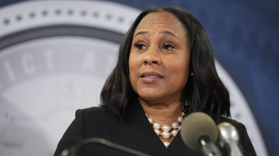 FILE - Fulton County District Attorney Fani Willis speaks in the Fulton County Government Center during a news conference, Monday, Aug. 14, 2023, in Atlanta. Donald Trump and several allies have been indicted in Georgia over efforts to overturn his 2020 election loss in the state. (AP Photo/John Bazemore, File)