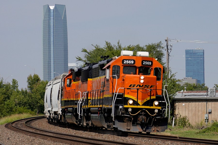 FILE - A BNSF locomotive heads south out of Oklahoma City, Sept. 14, 2022. On Thursday, Aug. 24, 2023, the major freight railroads said a disagreement over whether they will be allowed to discipline some workers who use a government hotline to report safety concerns have kept them from following through on the promise they made back in March to join the program after a fiery Ohio derailment prompted calls for reforms. (AP Photo/Sue Ogrocki, File)