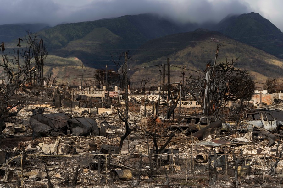 FILE - A general view shows the aftermath of a wildfire in Lahaina, Hawaii, Aug. 21, 2023. Hawaii’s electric utility acknowledged its power lines started a wildfire on Maui but faulted county firefighters for declaring the blaze contained and leaving the scene, only to have a second wildfire break out nearby and become the deadliest in the U.S. in more than a century. (AP Photo/Jae C. Hong, File)