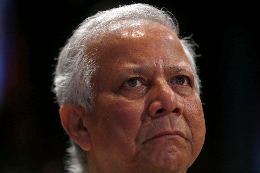 FILE- Nobel Peace Prize winner Muhammad Yunus listens to a discussion on poverty at the World Bank Group International Monetary Fund Spring Meetings in Washington, Friday, April 19, 2013. 160 global leaders including more than 100 Nobel laureates have written an open letter on Monday, Aug. 28, 2023, to the Bangladeshi Prime Minister Sheikh Hasina, urging her to suspend judicial proceedings against Nobel laureate Muhammad Yunus for alleged violation of labor laws. Supporters of Yunus say the charges are politically motivated because of differences he has with the prime minister. (AP Photo/Charles Dharapak, File)