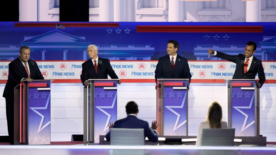 Businessman Vivek Ramaswamy, Florida Gov. Ron DeSantis and former Vice President Mike Pence look toward former New Jersey Gov. Chris Christie during a Republican presidential primary debate hosted by FOX News Channel Wednesday, Aug. 23, 2023, in Milwaukee.