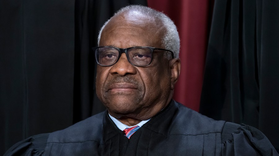 Justice Clarence Thomas sits for an official justice portrait.