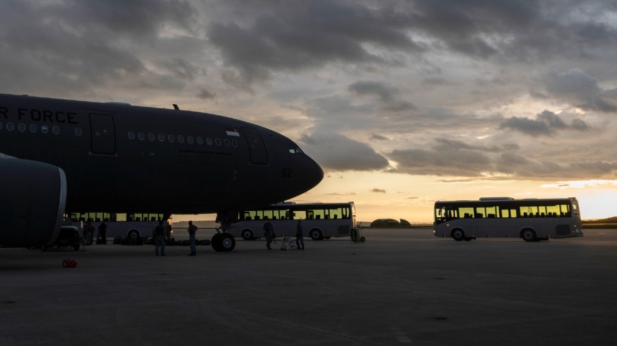 File - In this image provided by the U.S. Air Force, Air Force buses wait at Spangdahlem Air Base, Germany, on Friday, Aug. 27, 2021.