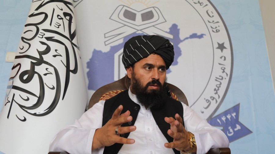 Molvi Mohammad Sadiq Akif, the spokesman for the Taliban's Ministry of Vice and Virtue, speaks during an interview in Kabul, Afghanistan, Thursday, Aug. 17, 2023. Molvi said that women lose value if their faces are visible to men in public and that the only way to wear the hijab, or the Islamic headscarf, is if the face is hidden. (AP Photo/Siddiqullah Alizai)