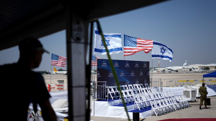 Israeli and U.S. flags fly during a rehearsal for the welcoming ceremony for U.S. President Joe Biden at Ben Gurion Airport near Tel Aviv, Israel Tuesday, July 12, 2022.