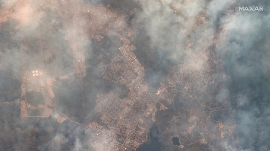 This image provided by Maxar Technologies, shows wildfires in Yellowknife, Northwest Territories Canada on Aug. 15, 2023.