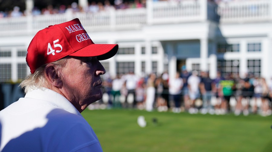 Former President Donald Trump looks over the 16th tee during the final round of the Bedminster Invitational LIV Golf tournament