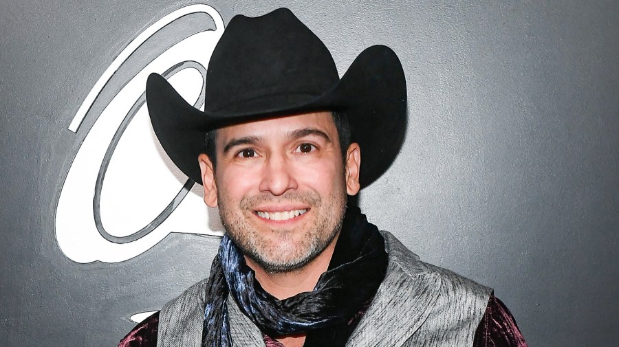 Bobby Pulido poses with an award backstage during the Premiere Ceremony for The 23rd Annual Latin Grammy Awards on November 17, 2022 in Las Vegas, Nevada.