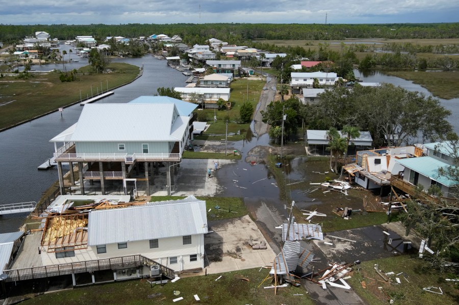 In this photo made in a flight provided by mediccorps.org, damaged homes are seen in Keaton Beach, Fla., following the passing of Hurricane Idalia, Wednesday, Aug. 30, 2023. (AP Photo/Rebecca Blackwell)