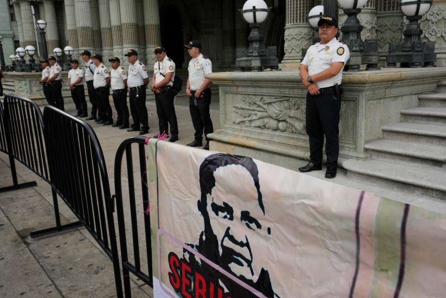 A banner with a portrait of the Attorney General Consuelo Porras hangs on a crowd control barrier during a protest against her actions against the Seed Movement party and President-Elect Bernardo Arévalo, at the Constitutional Square in Guatemala City, Saturday, Sept. 2, 2023.