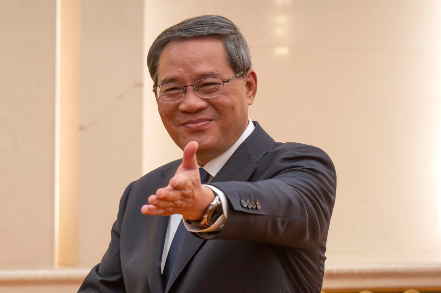 FILE - Chinese Premier Li Qiang attends a meeting with Asian Development Bank (ADB) President Masatsugu Asakawa, unseen, at the Great Hall of the People in Beijing, on July 11, 2023. Chinese President Xi Jinping is apparently skipping this week’s Group of 20 summit in India as bilateral relations remain icy. Instead, Premier Li Qiang will represent China at the Sept. 9-10 gathering, the Foreign Ministry said Monday, Sept. 4, 2023. (AP Photo/Mark Schiefelbein, Pool, File)