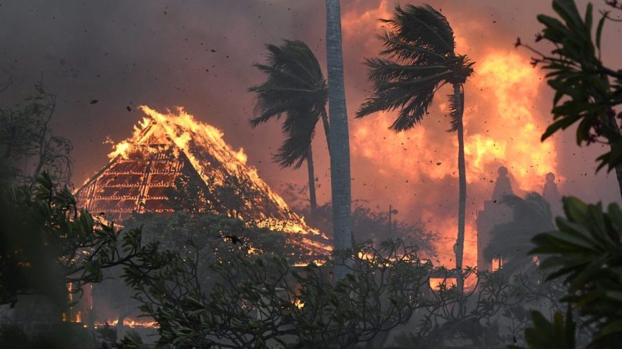 FILE - The hall of historic Waiola Church in Lahaina and nearby Lahaina Hongwanji Mission are engulfed in flames along Wainee Street, Aug. 8, 2023, in Lahaina, Hawaii. Nearly a month after the deadliest U.S. wildfire in more than a century killed scores of people, authorities on Maui are working their way through a list of the missing that has grown almost as quickly as names have been removed. Lawsuits are piling up in court over liability for the inferno, and businesses across the island are fretting about what the loss of tourism will mean for their futures. (Matthew Thayer/The Maui News via AP, File)