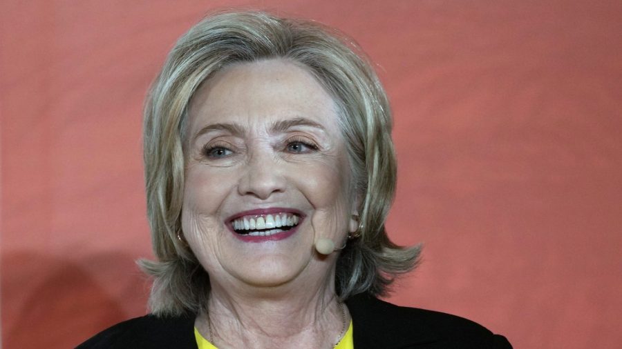 FILE - Former Secretary of State Hillary Clinton talks during the International Women's Day in Abu Dhabi, United Arab Emirates, March 8, 2023. Clinton is set to make a rare public appearance at the White House since losing her 2016 bid for the presidency, attending an arts event on Sept. 12, 2023, with first lady Jill Biden. (AP Photo/Kamran Jebreili, File)