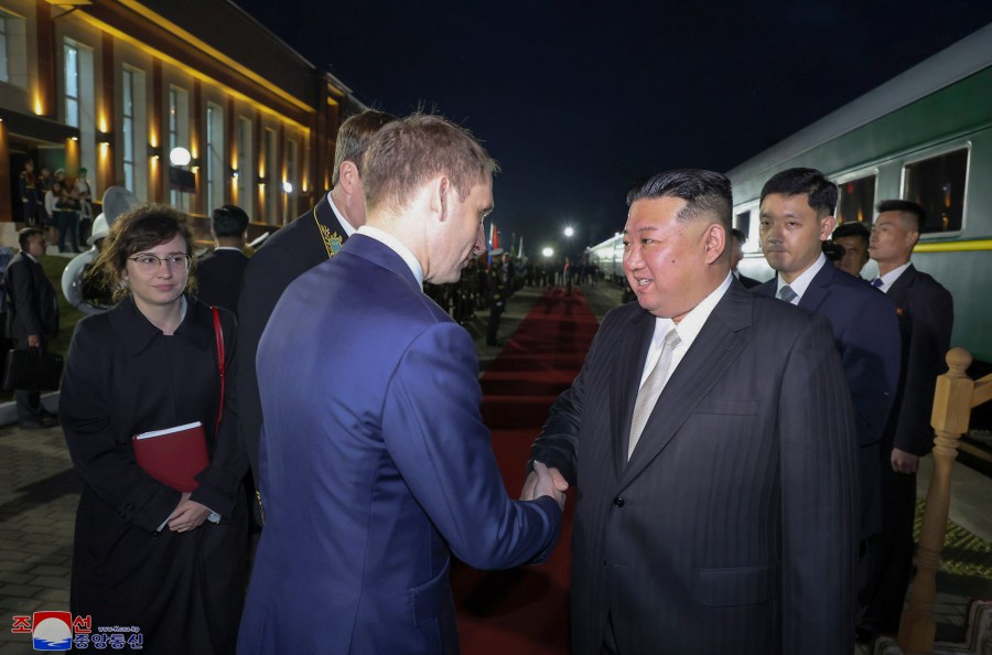 This Tuesday. Sept. 12, 2023, photo provided by the North Korean government shows that North Korea's leader Kim Jong Un, right, is greeted by Russian Minister of Natural Resources and Ecology Alexander Kozlov, left, after crossing the border to Russia at Khasan, about 127 km (79 miles) south of Vladivostok. Independent journalists were not given access to cover the event depicted in this image distributed by the North Korean government. The content of this image is as provided and cannot be independently verified. Korean language watermark on image as provided by source reads: "KCNA" which is the abbreviation for Korean Central News Agency. (Korean Central News Agency/Korea News Service via AP)