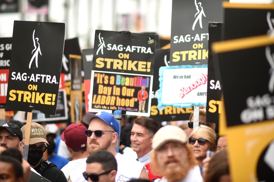 Picketers participate in a rally outside Paramount Pictures Studio on Wednesday, Sept. 13, 2023, in Los Angeles. The film and television industries remain paralyzed by Hollywood's dual actors and screenwriters strikes. (Photo by Richard Shotwell/Invision/AP)