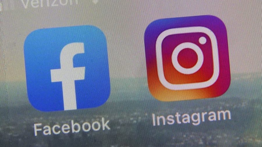 FILE - This photo shows the mobile phone app logos for, from left, Facebook and Instagram in New York, Oct. 5, 2021.