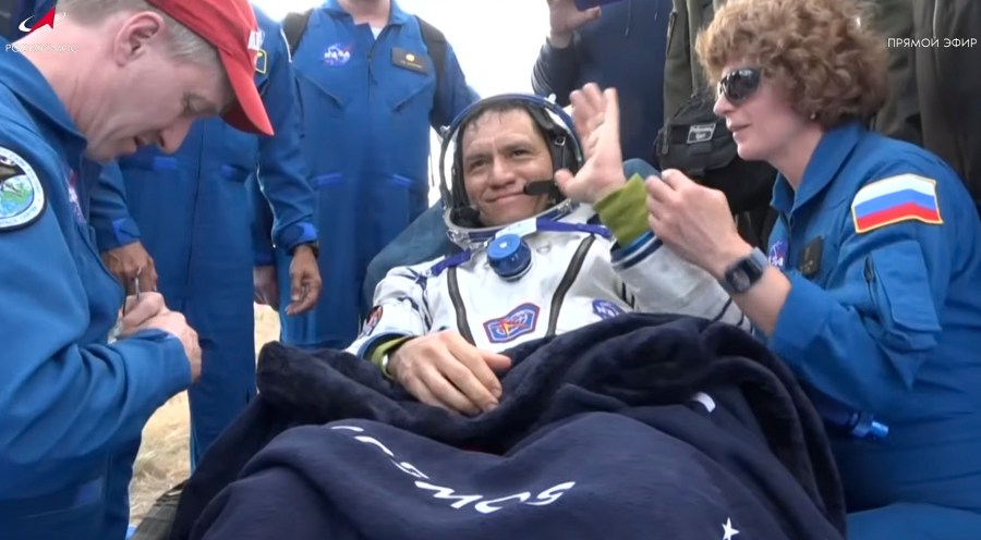 In this photo taken from video released by Roscosmos space corporation, NASA astronaut Frank Rubio sits in chairs shortly after the landing of the Russian Soyuz MS-23 space capsule about 150 km (90 miles) south-east of the Kazakh town of Zhezkazgan, Kazakhstan, Wednesday, Sept. 27, 2023. The Soyuz capsule carrying NASA astronaut Frank Rubio, Roscosmos cosmonauts Sergey Prokopyev, and Dmitri Petelin, touched down on Wednesday on the steppes of Kazakhstan. (Roscosmos space corporation via AP)