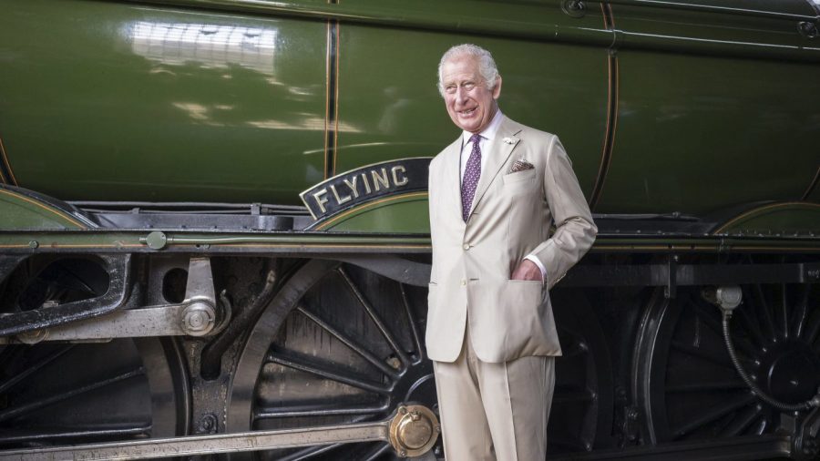 FILE - Britain's King Charles III stands by the Flying Scotsman, a historical locomotive, at Pickering Heritage Railway Station, the southern terminus of the North Yorkshire Moors Railway, for a visit to Pickering in Yorkshire, England, Monday, June 12, 2023. Several people were injured after the Flying Scotsman, the historic steam locomotive, was involved in a “low speed” crash with another heritage train in the Scottish Highlands on Friday, Sept. 29, 2023. (Charlotte Graham/Pool Photo via AP, File)