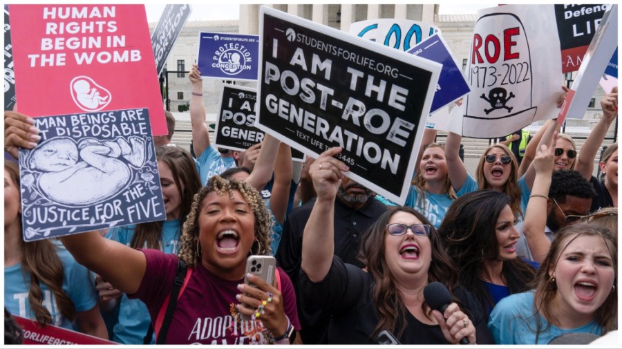 FILE - Demonstrators gather outside the Supreme Court in Washington, Friday, June 24, 2022. (AP Photo/Jose Luis Magana, File)