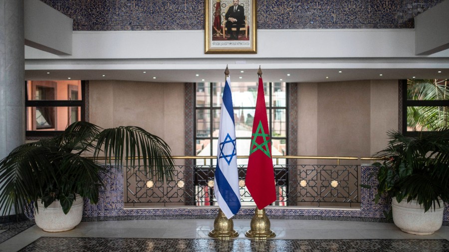 Moroccan and Israeli flags are displayed in the Moroccan Foreign Ministry in Rabat, Morocco, Aug. 11, 2021.