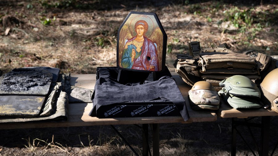 A damaged chest plate that had been decorated and other damaged equipment is displayed as U.S, Secretary of State Antony Blinken tourin a State Border Guard of Ukraine Detached Commandant Office of Security and Resource Supply site Thursday, Sept. 7, 2023, in the Kyiv Oblast, Ukraine.