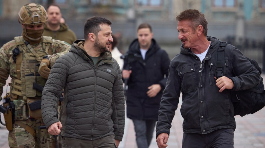 In this photo provided by the Ukrainian Presidential Press Office, Ukrainian President Volodymyr Zelenskyy, left, walks with U.S. actor Sean Penn after their meeting in Kyiv, Ukraine, Tuesday, Nov. 8, 2022.