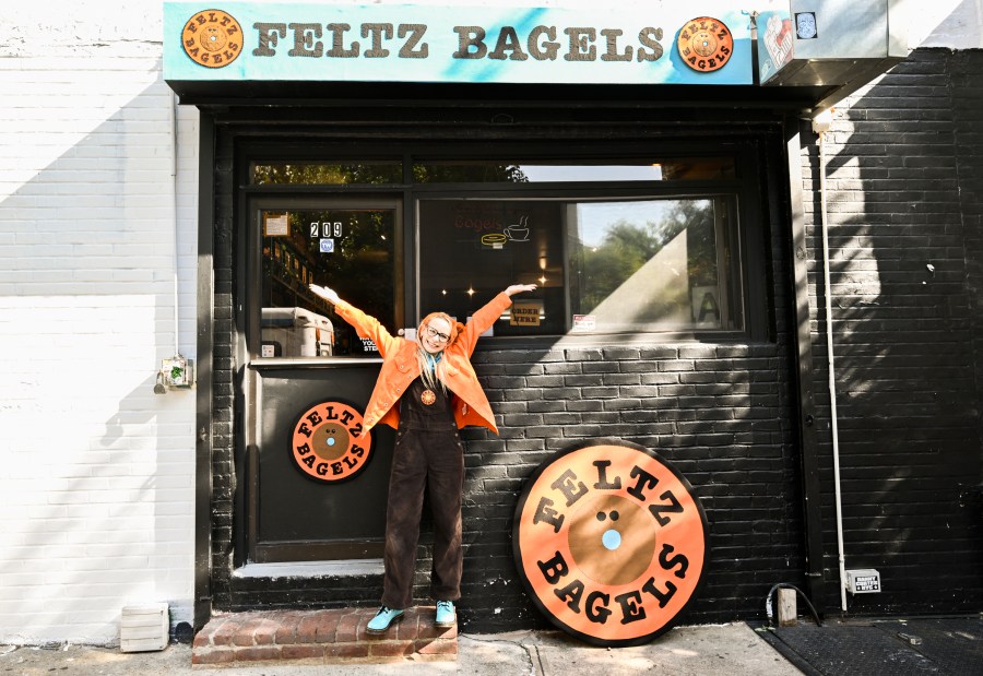 British artist Lucy Sparrow is pictured at her "Feltz Bagels" installation on Monday, Oct. 2, 2023, in New York. Opening Tuesday, the installation uses approximately 30,000 pieces of felt to recreate the look and feel of the authentic Jewish bagel shops prominent in New York’s Lower East Side neighborhood. It runs through October. (Photo by Evan Agostini/Invision/AP)