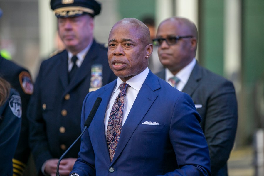 FILE - New York City Mayor Eric Adams speaks in New York's Times Square during a news conference, Dec. 30, 2022. On Tuesday, Oct. 3, 2023, Adams said he will travel to Latin America to discourage people from seeking asylum in the city as it struggles to handle a massive influx of migrants that have overwhelmed its shelter system and strained financial resources. (AP Photo/Ted Shaffrey, File)