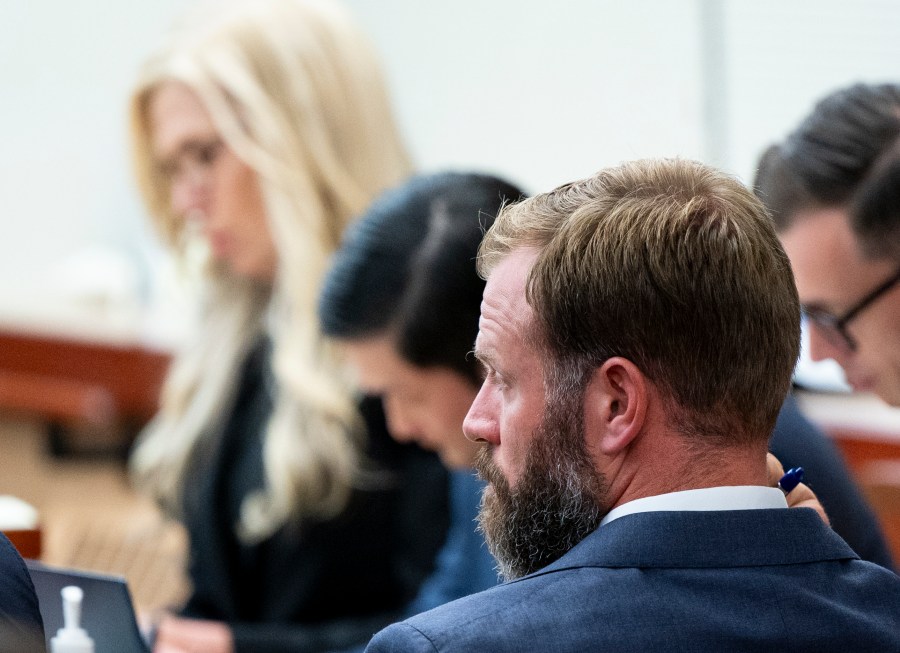 Defendant Matthew Collins looks on while the state gives opening statements during the trial of Tacoma Police Officers Christopher Burbank, Matthew Collins and Timothy Rankine in the killing of Manny Ellis, Tuesday, Oct. 3, 2023, at Pierce County Superior Court, Tacoma, Wash. (Brian Hayes/The News Tribune via AP, Pool)