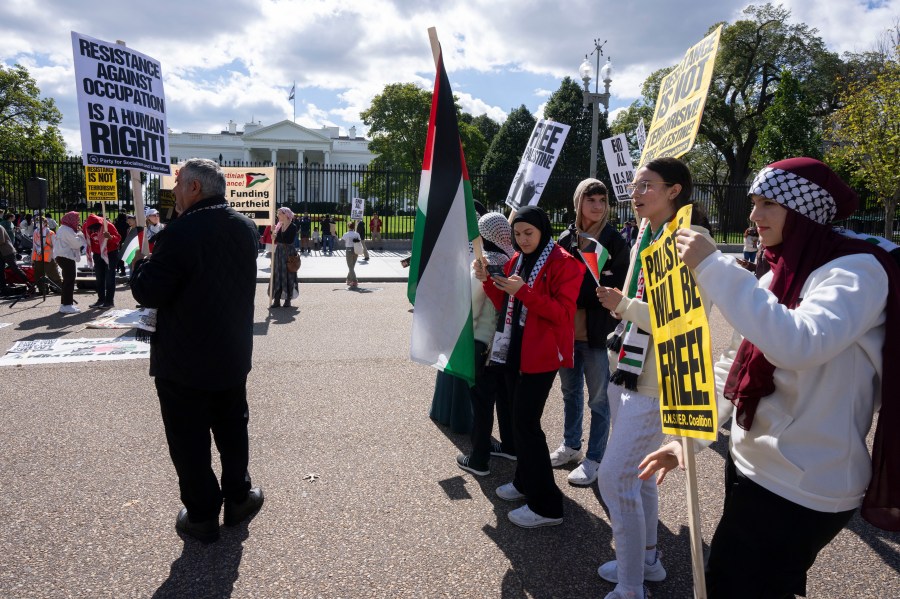 Pro-Palestinian demonstrators rally outside the White House in Washington, Sunday, Oct. 8, 2023. Supporters of Israel and backers of the Palestinian cause rallied in many American cities Sunday over the conflict that has killed hundreds and wounded thousands in the Middle East. (AP Photo/Manuel Balce Ceneta)